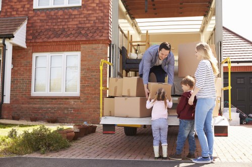 Professional office moving team handling furniture relocation in Upminsterbridge